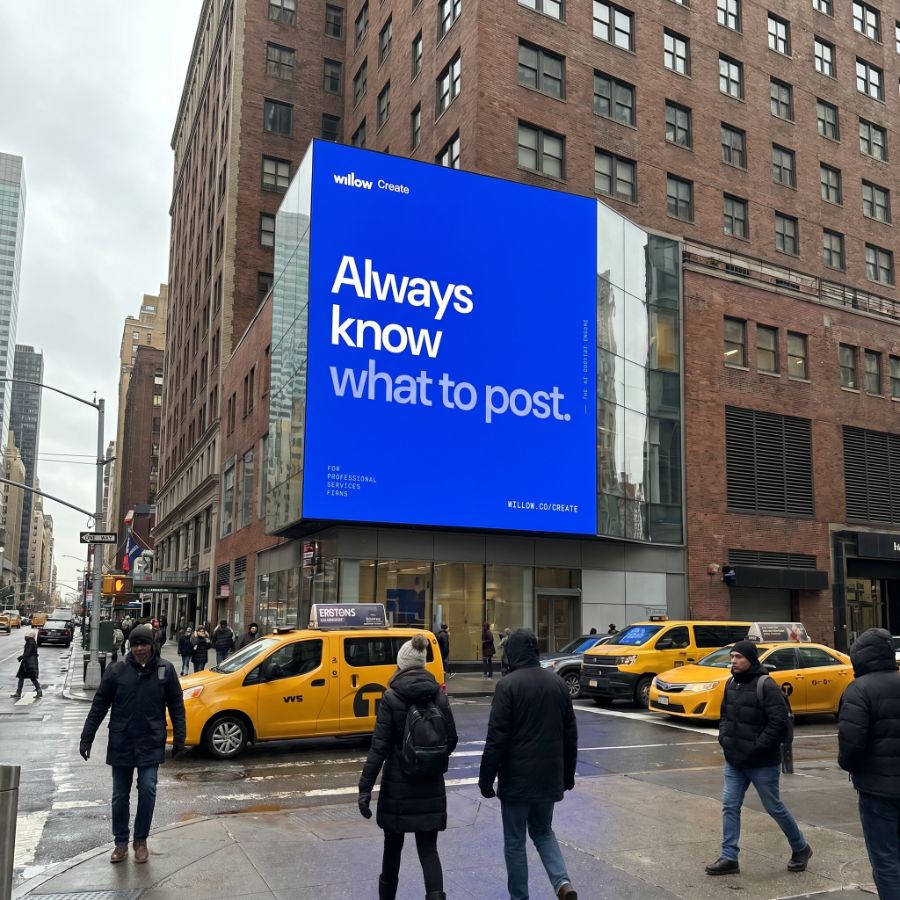Willow Create blue digital billboard in the city reading 'Always know what to post.'